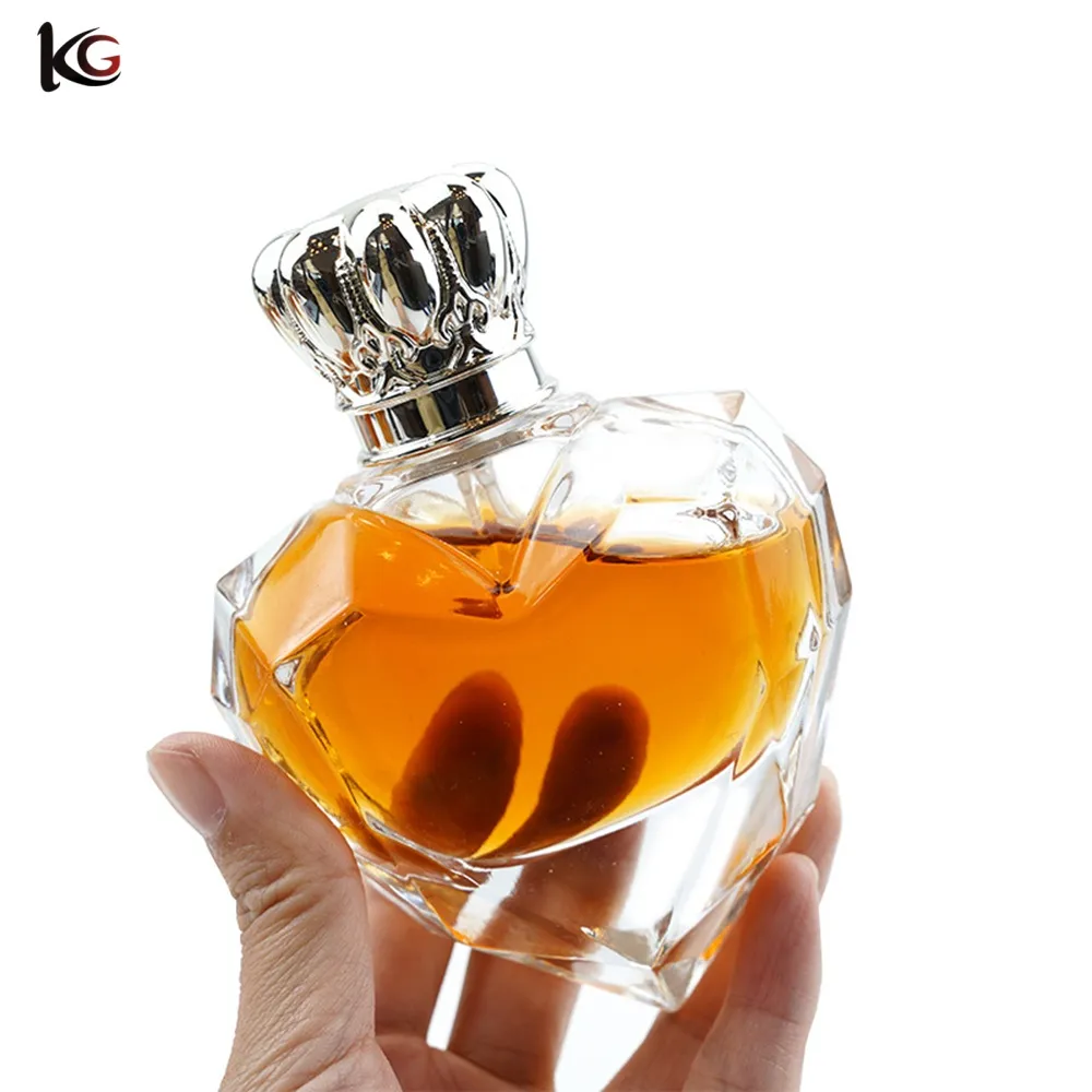 Perfume bottle- (9) Wholesale 50ml Glass Heart Perfume Bottles No Leakage with silver cap and Spray - Image 1